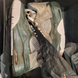 Jack Daniel’s x The Shoe Surgeon x Air Jordan 4 ‘Cave Spring’